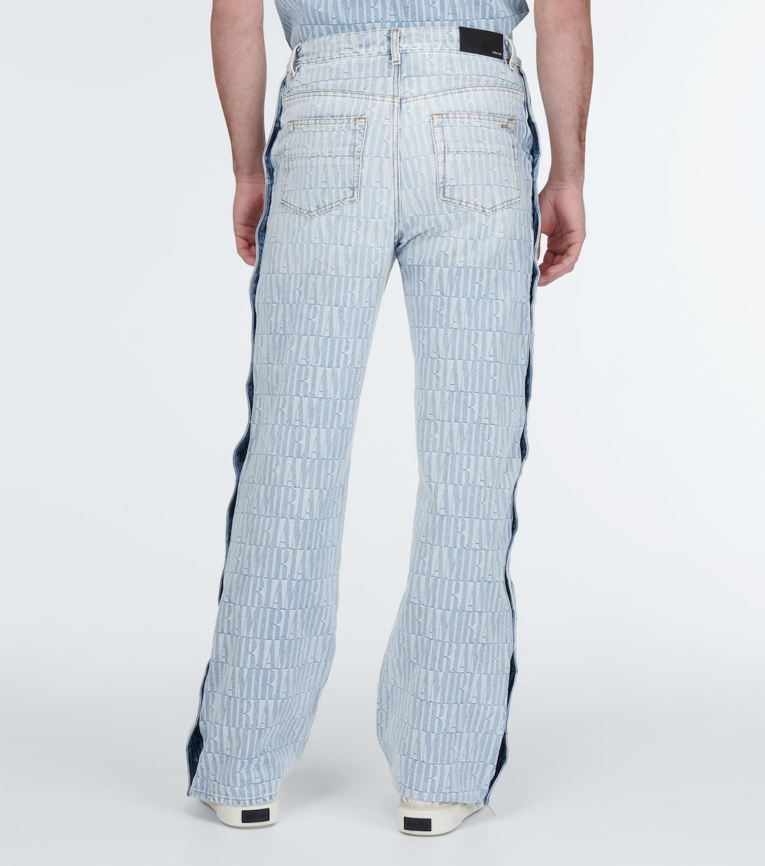 Amiri - Logo jacquard denim pants