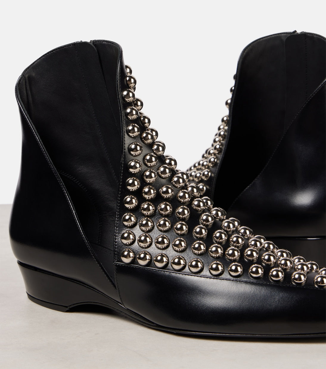 Alaïa - Studded leather ankle boots
