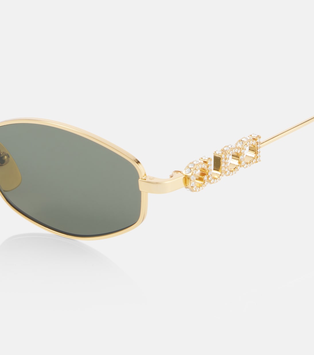 Gucci - Logo embellished oval sunglasses