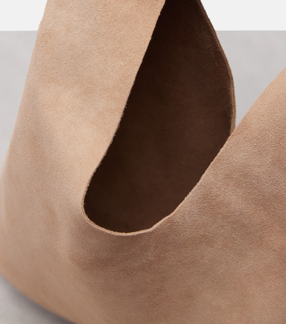 The Row - Bindle Small suede top-handle bag