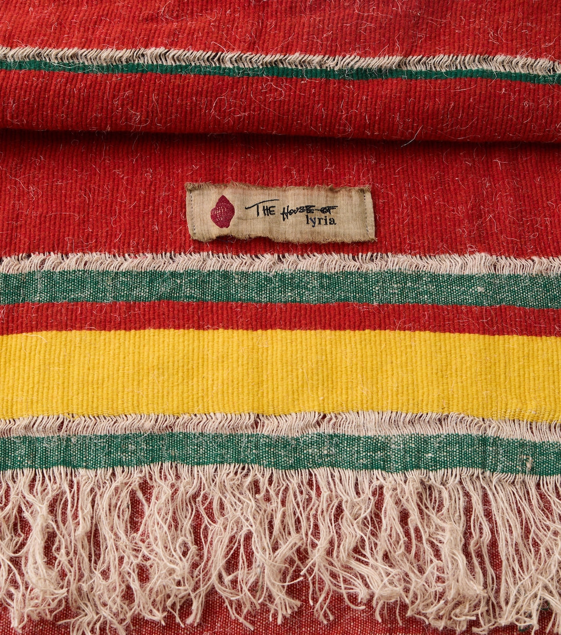 The House of Lyria - Xoroi striped wool-blend throw