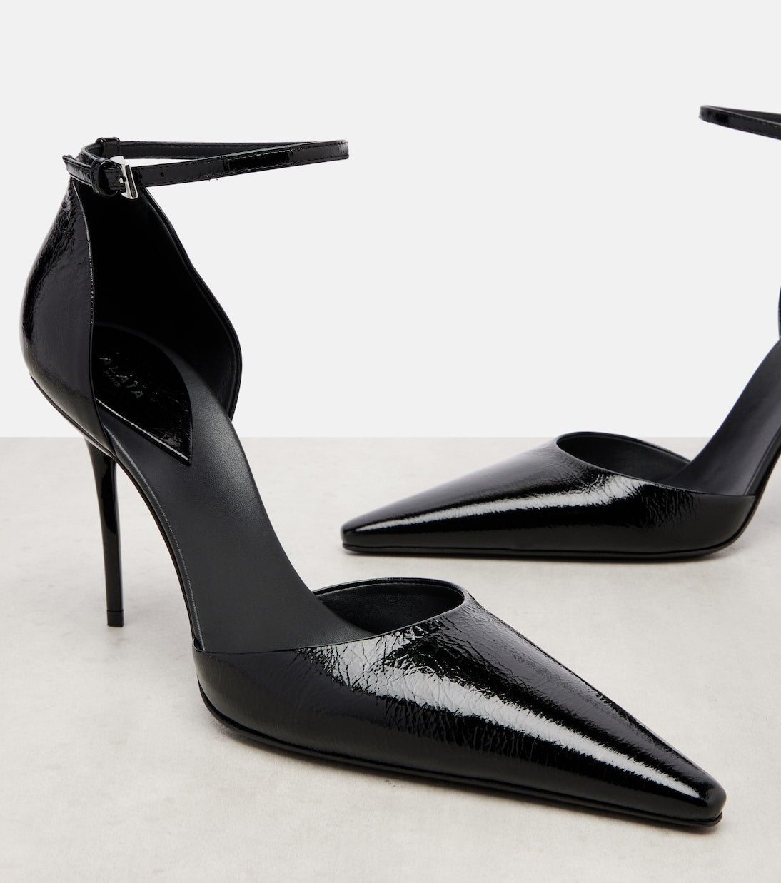 Alaïa - D'Orsay 90 patent leather pumps