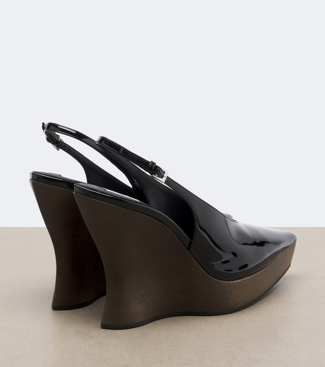 Alaïa - Patent leather wedge slingback clogs