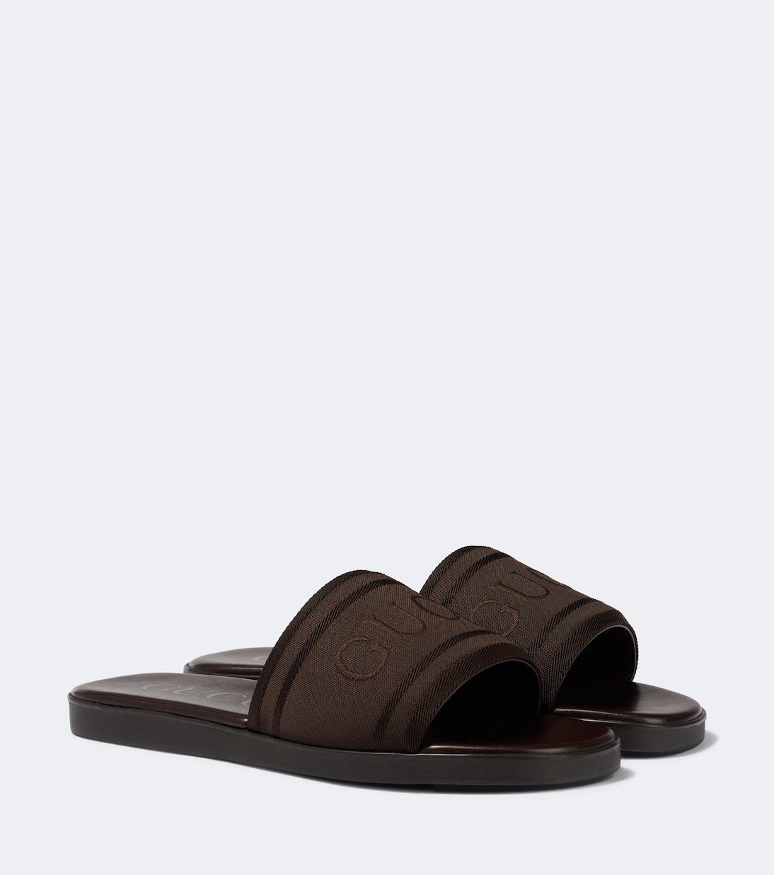 Gucci - Logo canvas and leather slides
