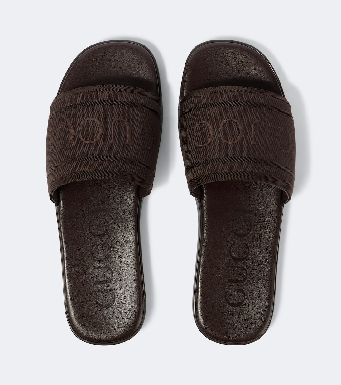 Gucci - Logo canvas and leather slides
