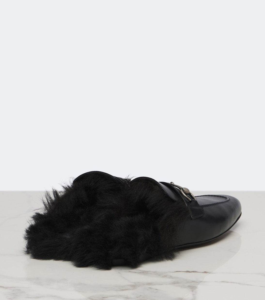 Gucci - Casanova shearling-lined leather mules