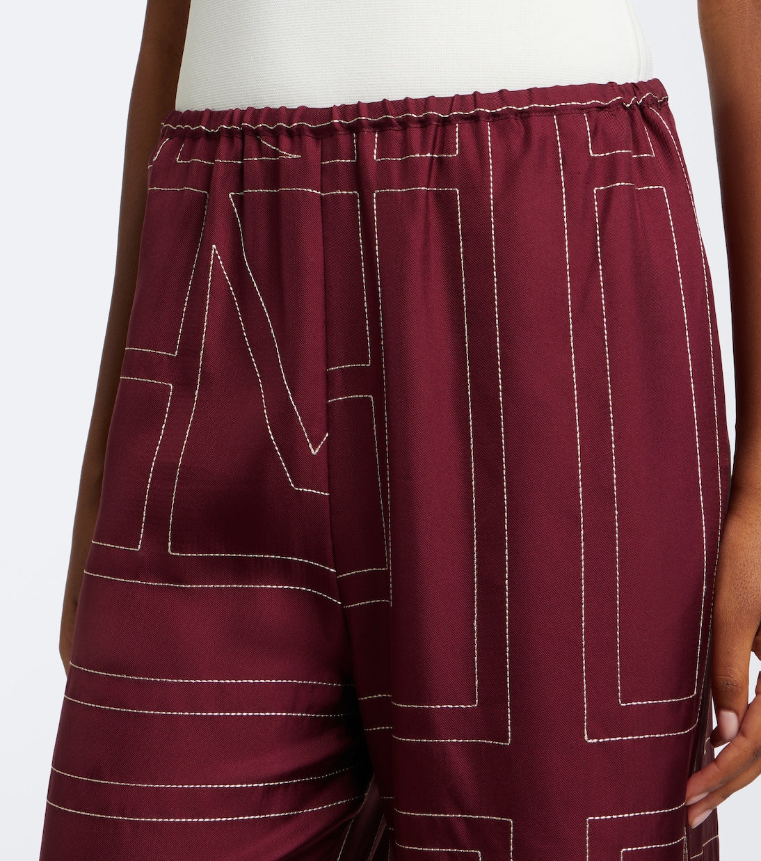 Toteme - Monogram silk twill wide-leg pants