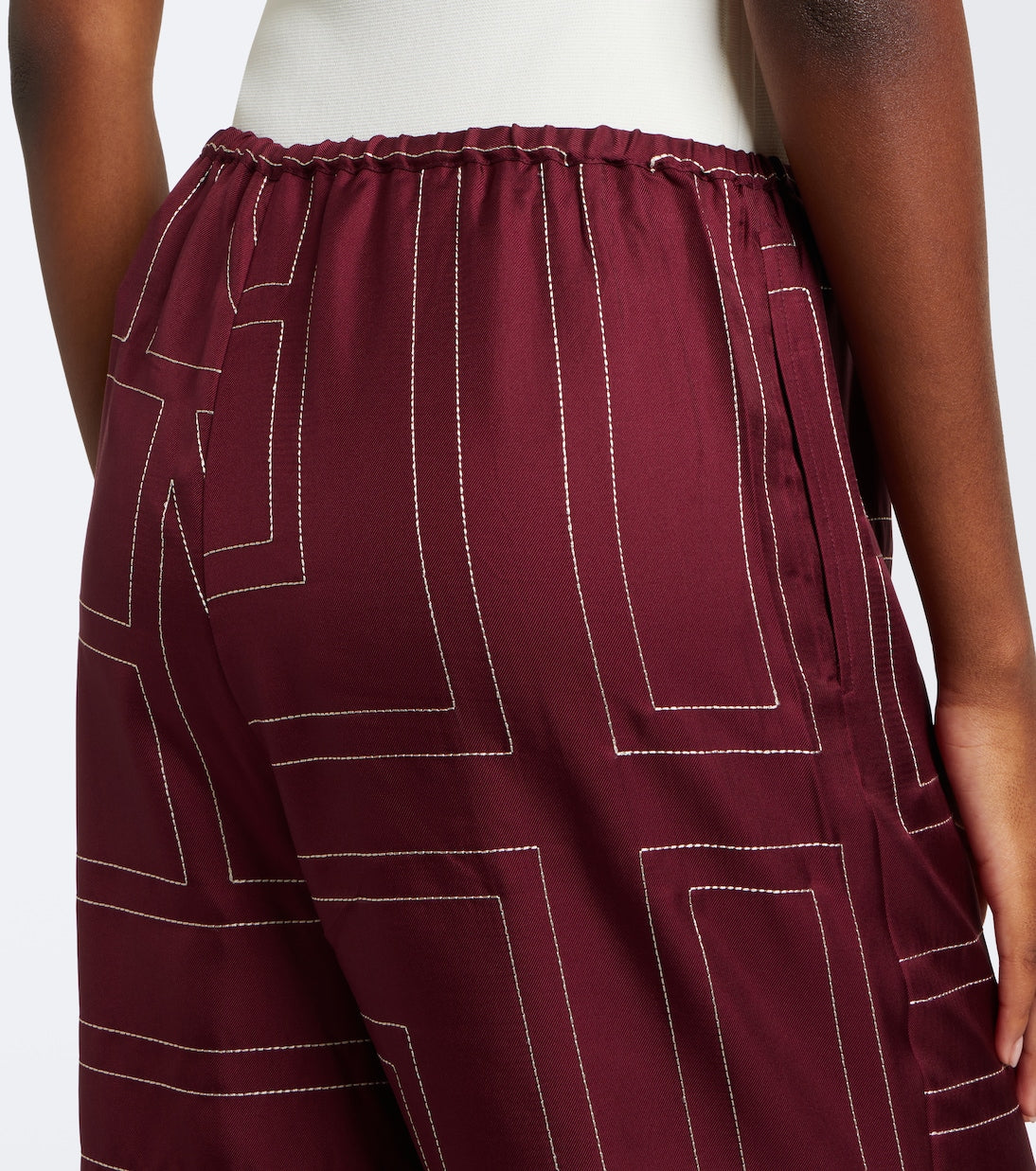 Toteme - Monogram silk twill wide-leg pants